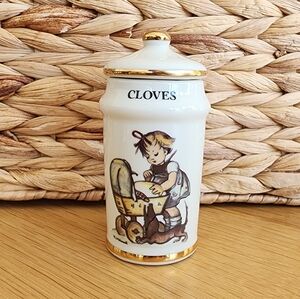 Vintage M. J. Hummel Ceramic Cloves Jar with Gold Accents